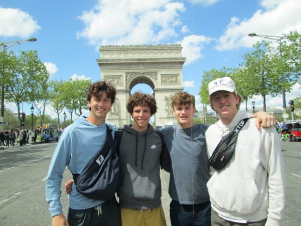 Griffin McGirr, Joe Gibson, Jesse Styles, and Peter Nelson take in the Arc de Triomphe in Paris, France, April 2024