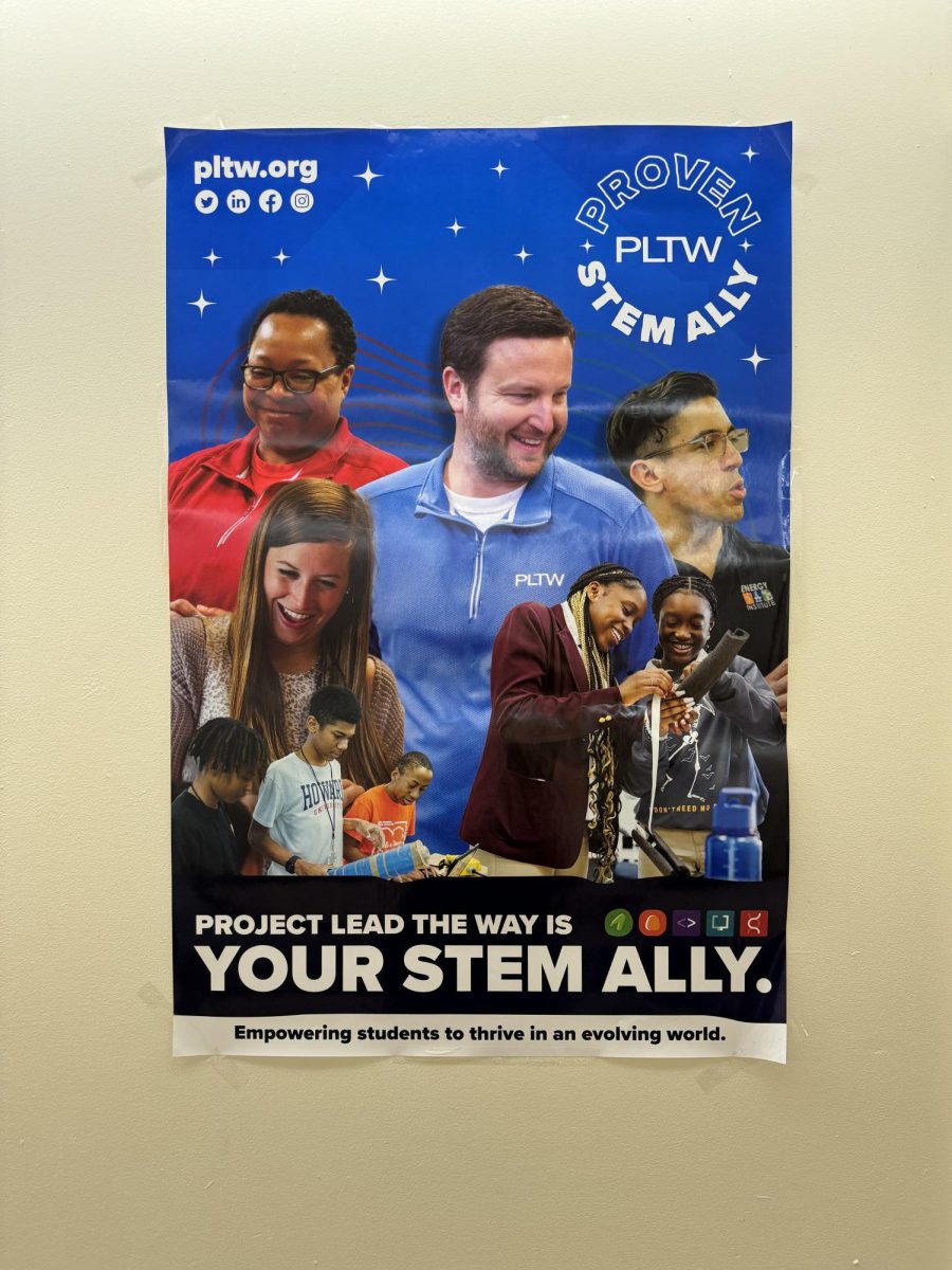 A Project Lead The Way poster hangs in the science wing