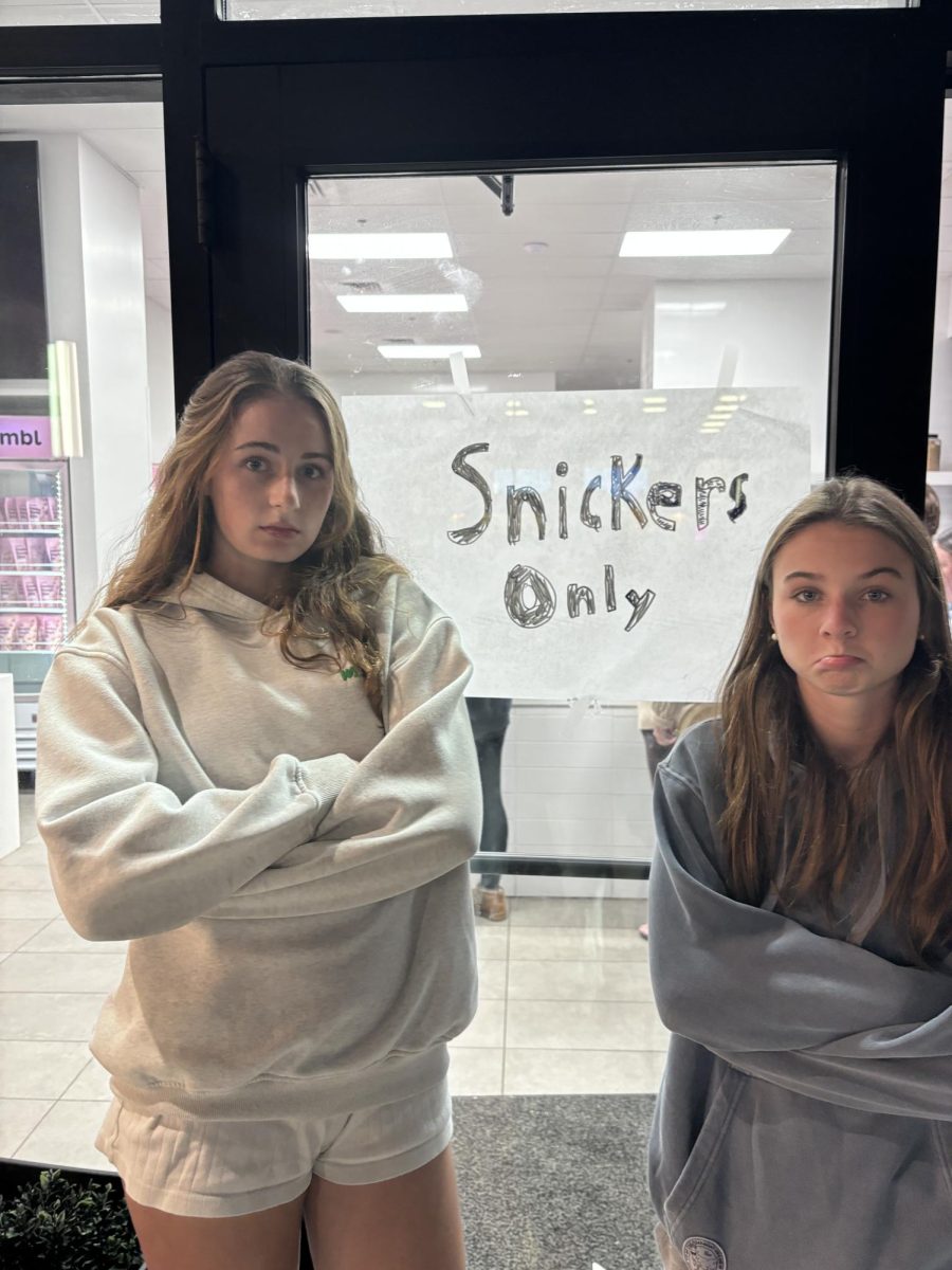 Seniors Madison Quirk and Cecilia Griffin (pictured from left to right) disappointed by the lack of cookies at Crumbl.